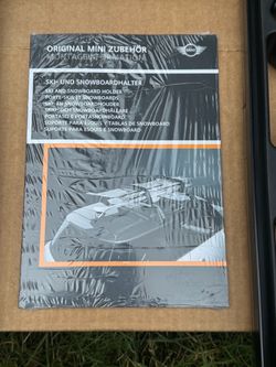 Ski & snowboard holder for Mini Cooper roof rack.