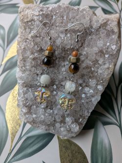 Gemstone earrings with moon face dangles