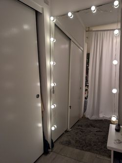 Two 7-ft mirrors for sale. 1 with vanity lights