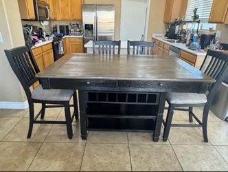 Dining table with drawers