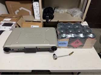 Moving sale! Coleman Tabletop 2-in-1 Grill & Stove and 12 gas cylinder