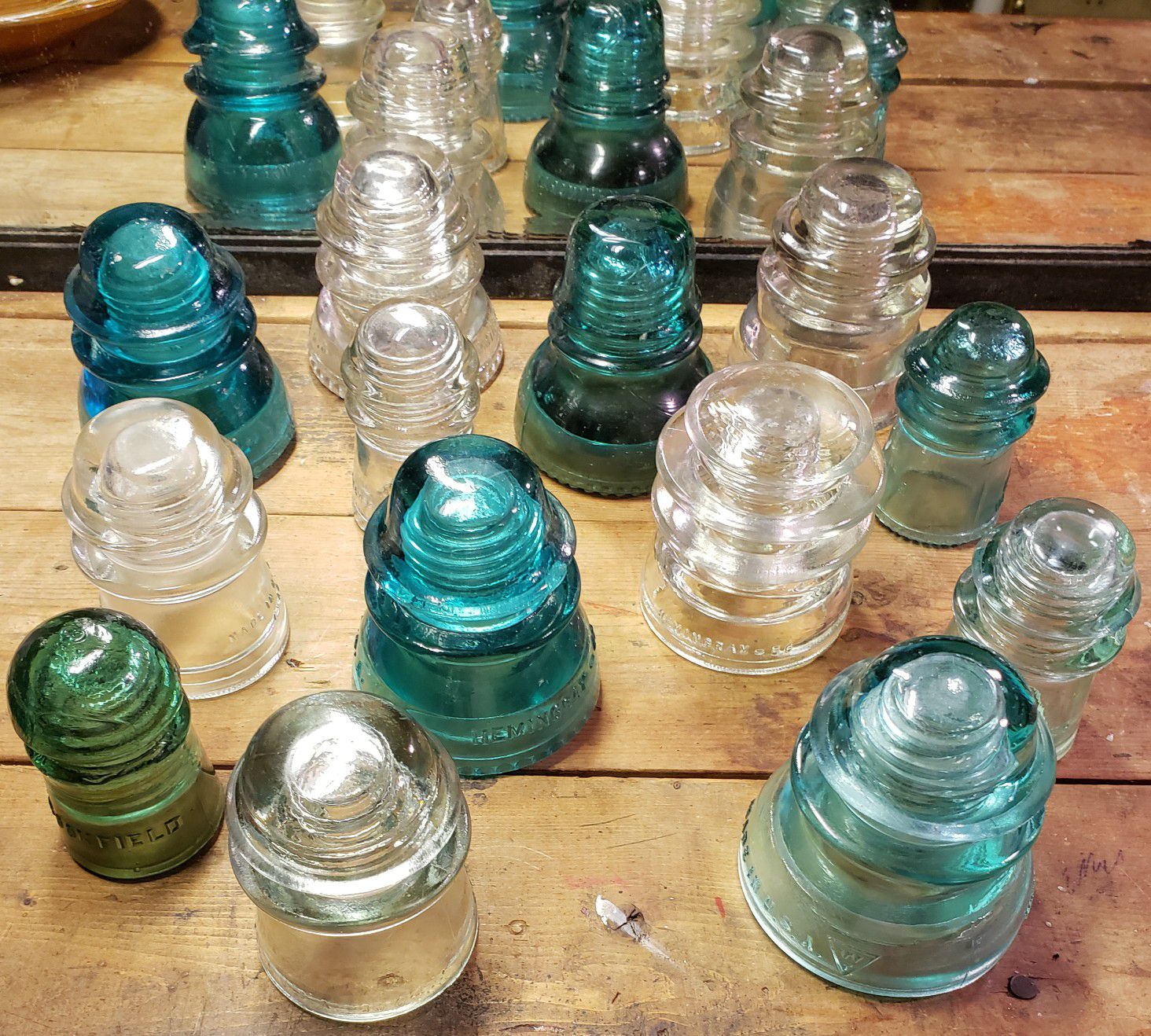 14 antique glass insulators