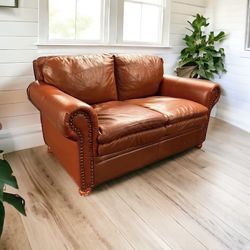 $70 for (1) Tropical Themed Orange/Brown Loveseat