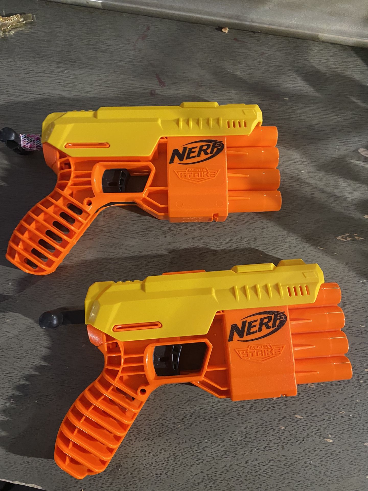 2 Nerf Guns And a Box Full Of Darts 