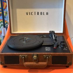 Victrola Portable Record Player with Built In Speakers and Bluetooth Connectivity (Brown Leather)