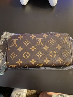 Brand new Louis Vuitton Brown zippy wallet