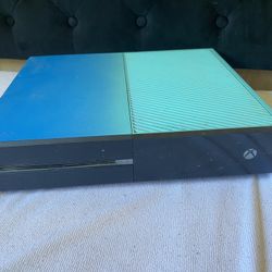 Xbox 1 with blue top and Cords