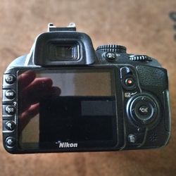NIKON  D3100