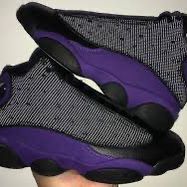 purple and black jordan 13’s