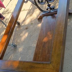 Coffee table wood and comes with glass top