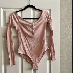 NWOT pink Francesca’s Bodysuit 