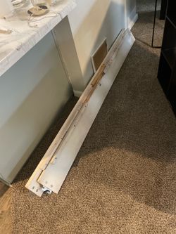 King sized white wooden bed frame