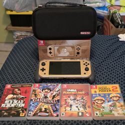 Gold Nintendo Switch Lite Bundle With 4 Games!!