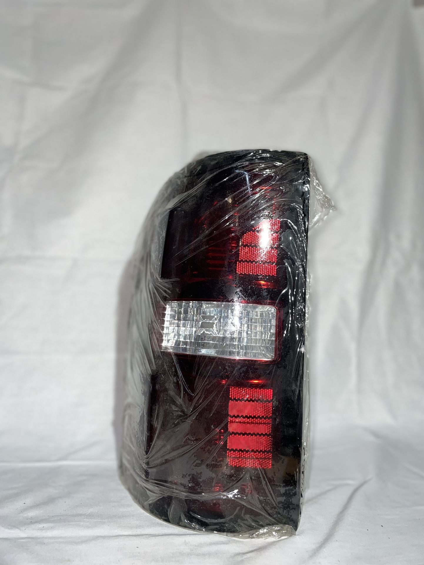 Never Been Used GMC SIERRA Tail Lights 