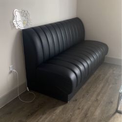 firm black club sofa 