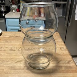 Two clear stacking glass bowls