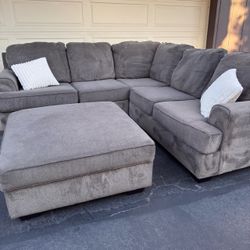 Gray Sectional Couch With Huge Ottoman And Storage
