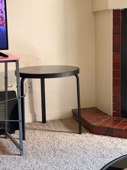 Black glass side table