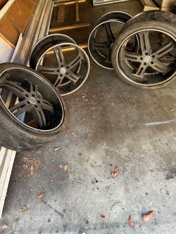 22 “ rims with only 2 tires (OBO)