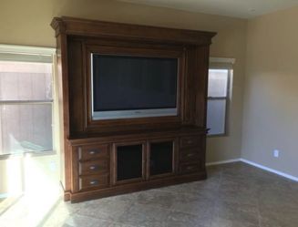 Stonecreek entertainment center with 65 inch plasma TV Panasonic