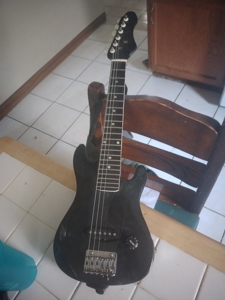   Small little Black Electric ⚡ Guitar 🎸 With Strap 