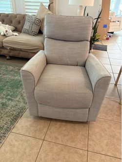 Gray Swivel nursery chair