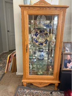 Oak curio cabinet