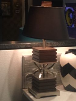 Pier one brown wood & brushed stainless lamp. Pier 1 imports a few years ago purchase. Maybe I do or don’t still have black shade. Will look in war