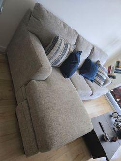 Sofa with interchangeable footrest