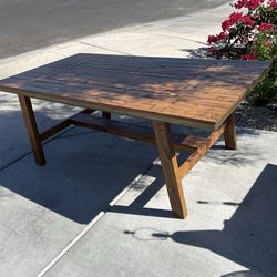 Wooden dining table- farmhouse style