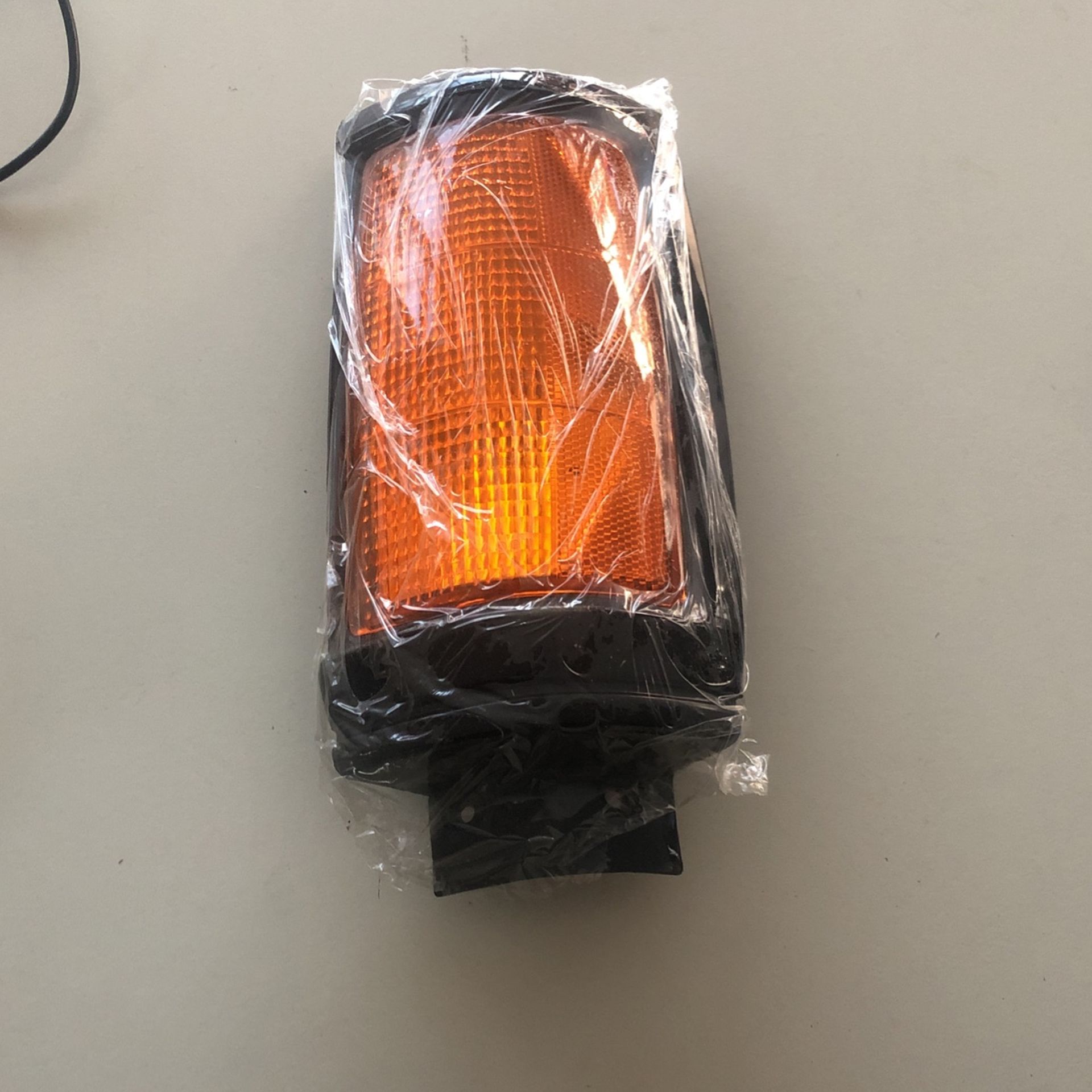 Mitsubishi P/ U Park Lamp ( Black) Driver Side Assembly