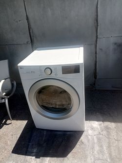 LG dryer machine glass front door white color