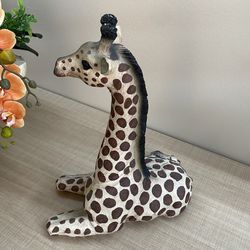 Seated giraffe