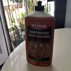 Woman hardwood polish & restorer