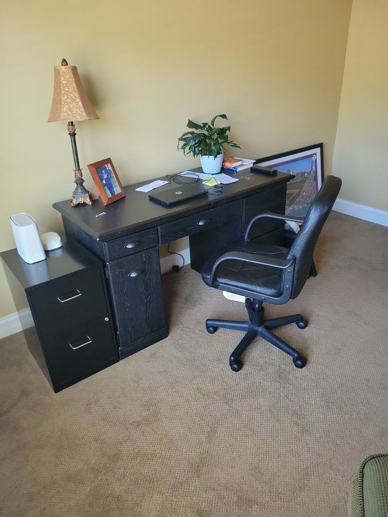 Black desk with chair