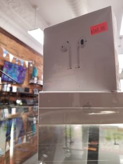 Brand New unopened Apple AirPods with Charging Case MV7N2AM/A model A2032 at RizTech Medina