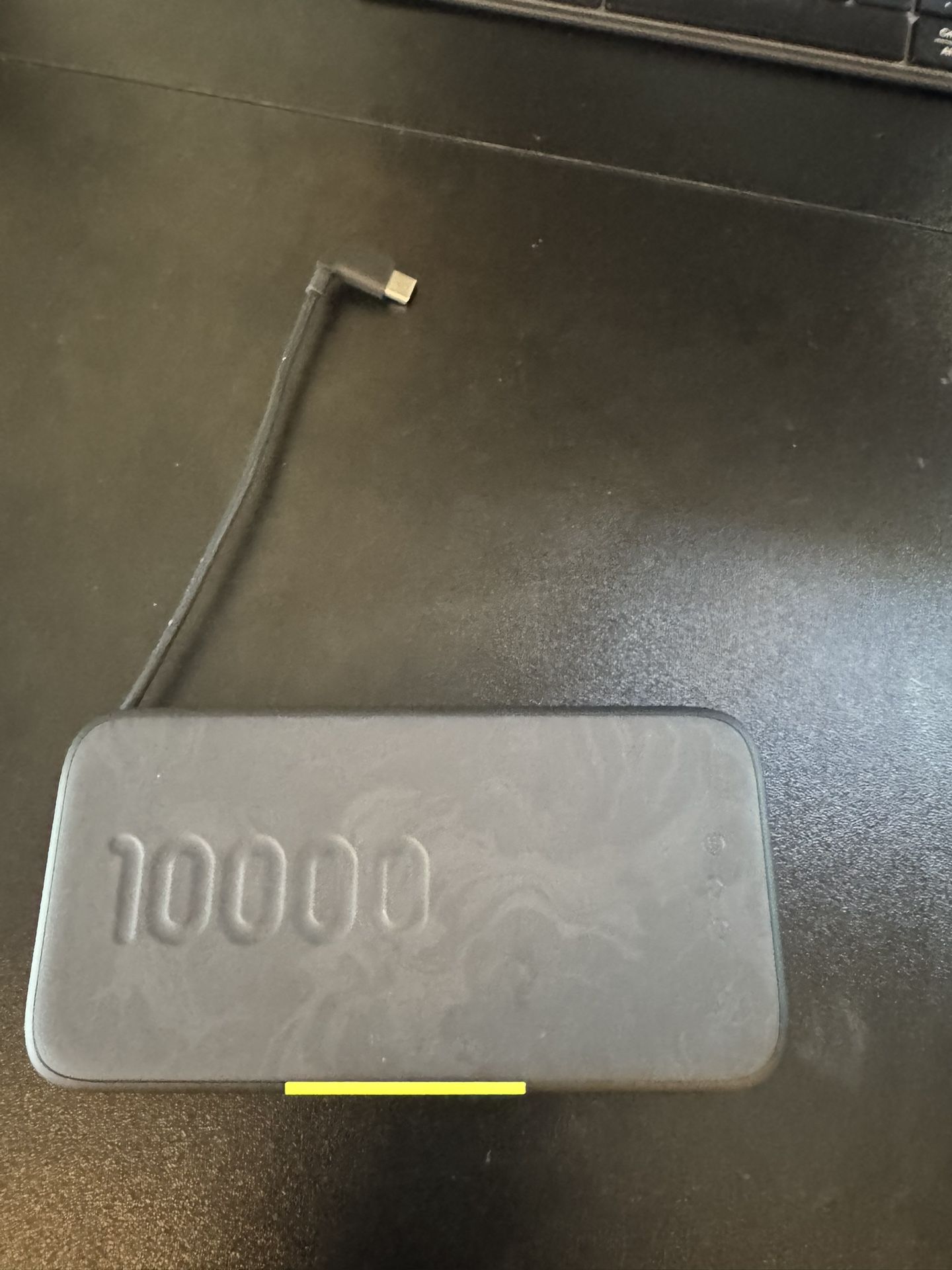 Slim 10,000 mAh Portable Power Bank with Built-in USB-C Cable