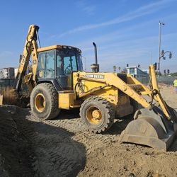 John Deere Backhoe  710D