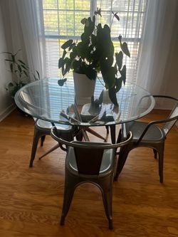 Glass Top Dining Table with Metal Base with chairs