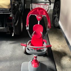 Radio Flyer 4-in-1 Stroll 'N Trike - Red: Adjustable Seat, Steel Frame, Ages 1-5