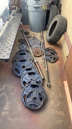 Weights about 350 pounds plus the bars