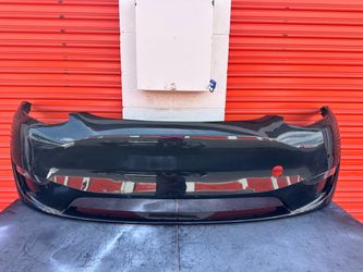2020 -2024 Tesla Model Y Front bumper with Fog Lights  Right- left OEM