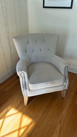 Barrel-back, button-tufted easy chair