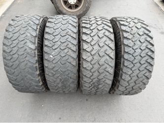 (4) 37x12.50R18 Nitto Trail Grappler M/T Tires