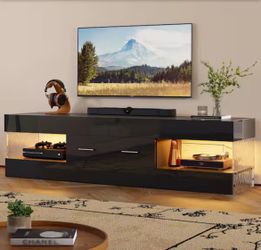 60 in. Glossy Black Ripple Side TV Stand Fits TV Up to 65 in. Entertainment Center with Drawer LED Light