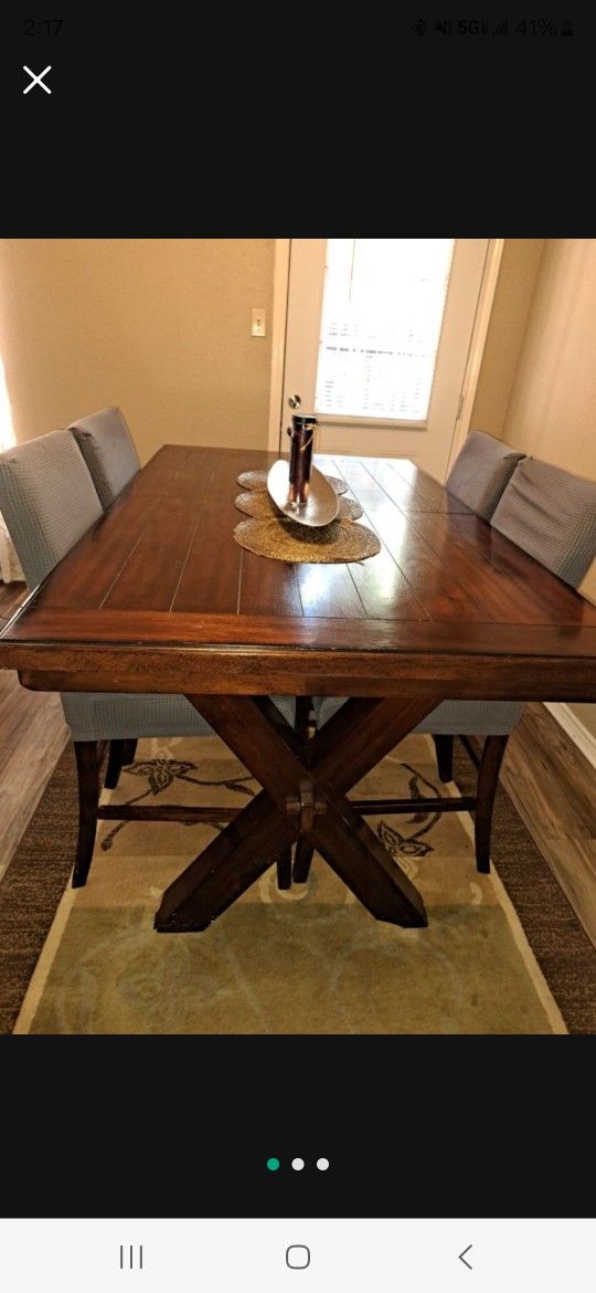 Dinning Table With Chairs The Chairs Have Polyester Covers On Them Good Condition Asking For $200 Obo