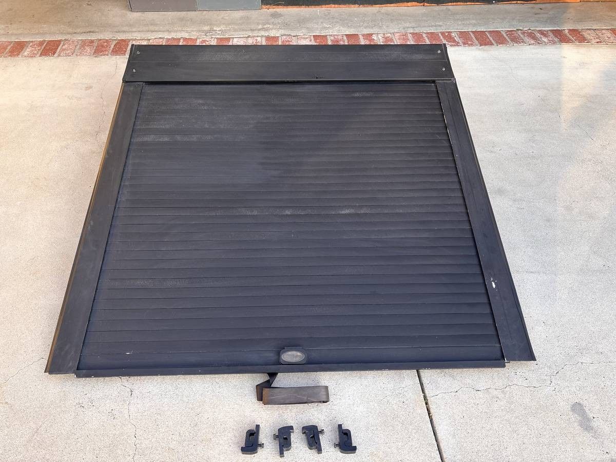 Retractible Tonneau Cover (hard) by Truck Covers USA.