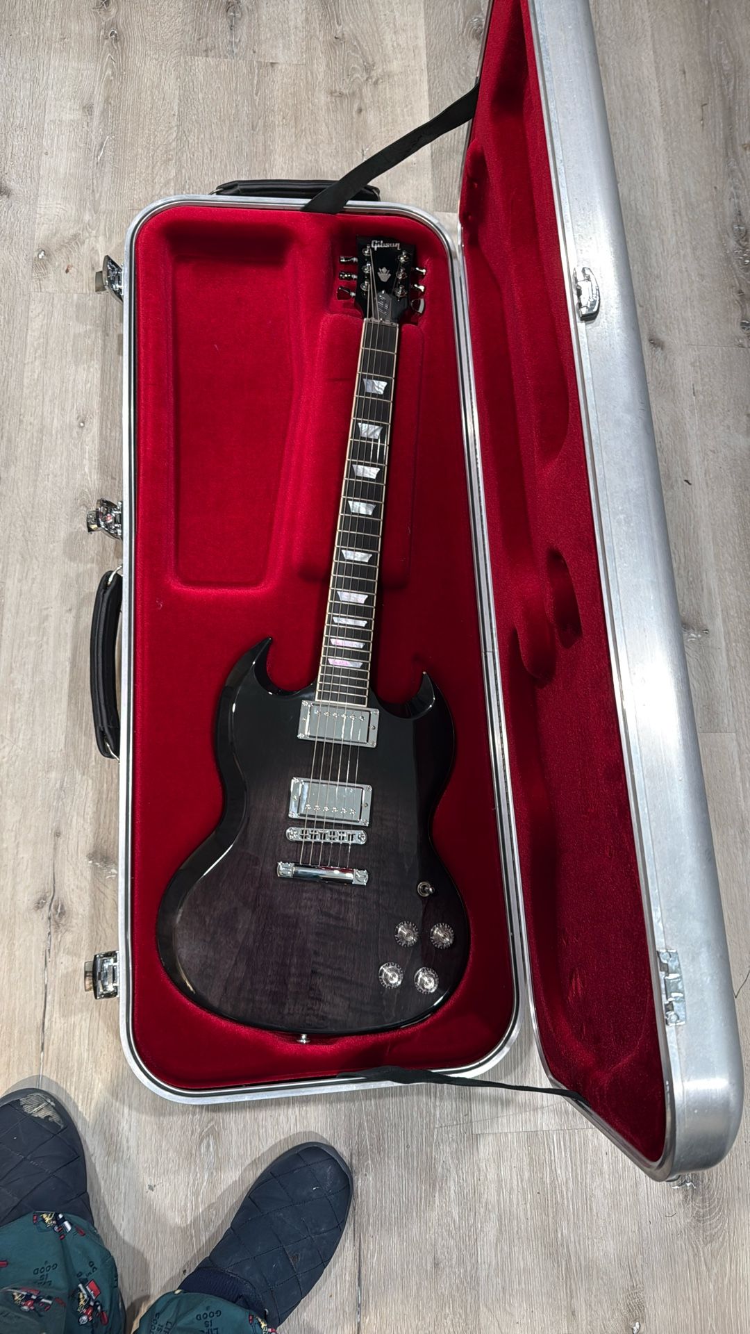Gibson SG HP only played once or twice at home. Excellent condition except for small chip.