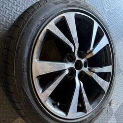 Nissan maxima stock rim