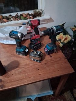1 Makita Impact 1 Makita Drill 3 18 Volt Battries  1 Milwaukee 18 Volt Impact And 2 M18 Battries All For 200.00 Cash 